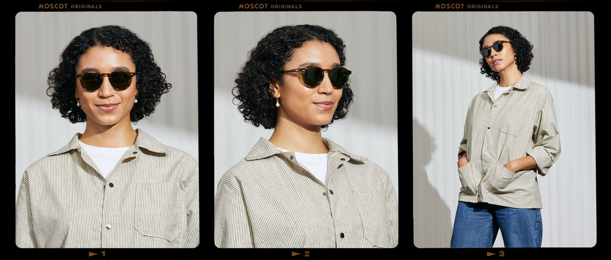 Model is wearing The MILTZEN SUN in Bamboo in size 49 with Calibar Green Glass Lenses