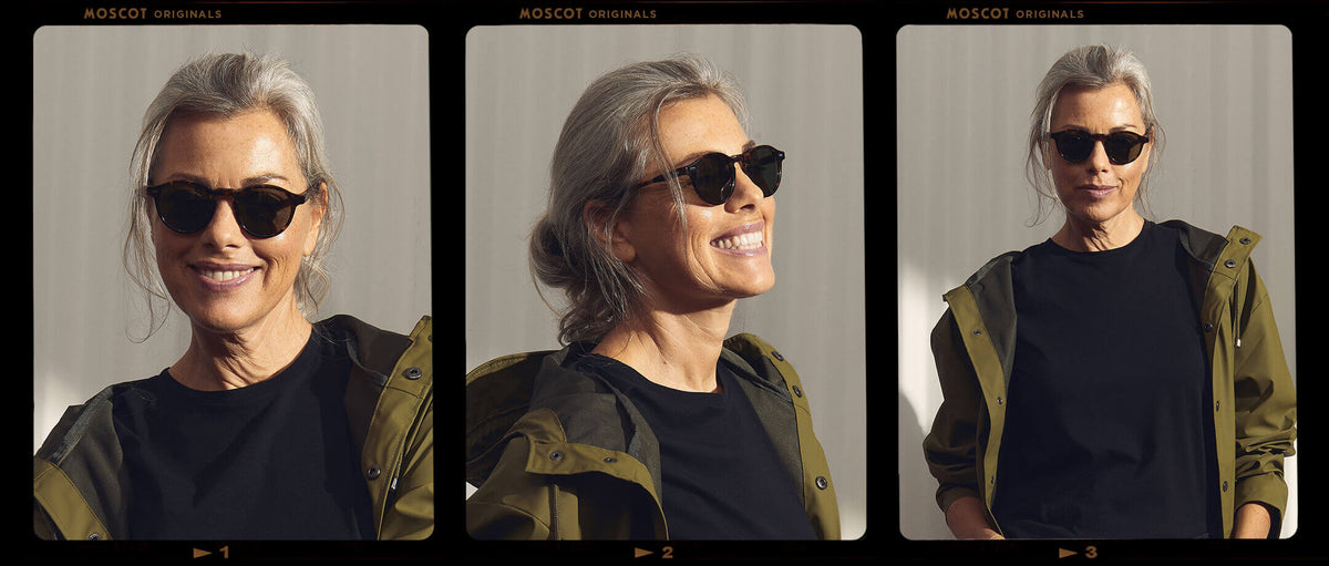 Model is wearing The MILTZEN SUN in Tortoise in size 46 with G-15 Glass Lenses