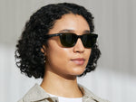 Model is wearing The BOYCHIK SUN in Dark Green in size 52 with Calibar Green Glass Lenses
