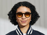 Model is wearing The GAVOLT SUN in Dark Green in size 48 with Chestnut Fade Tinted Lenses