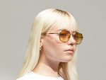 Model is wearing The MIZER SUN in size 54 in Bamboo with Chestnut Fade Tinted Lenses
