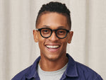 Model is wearing The DAHVEN in size 44 in Black
